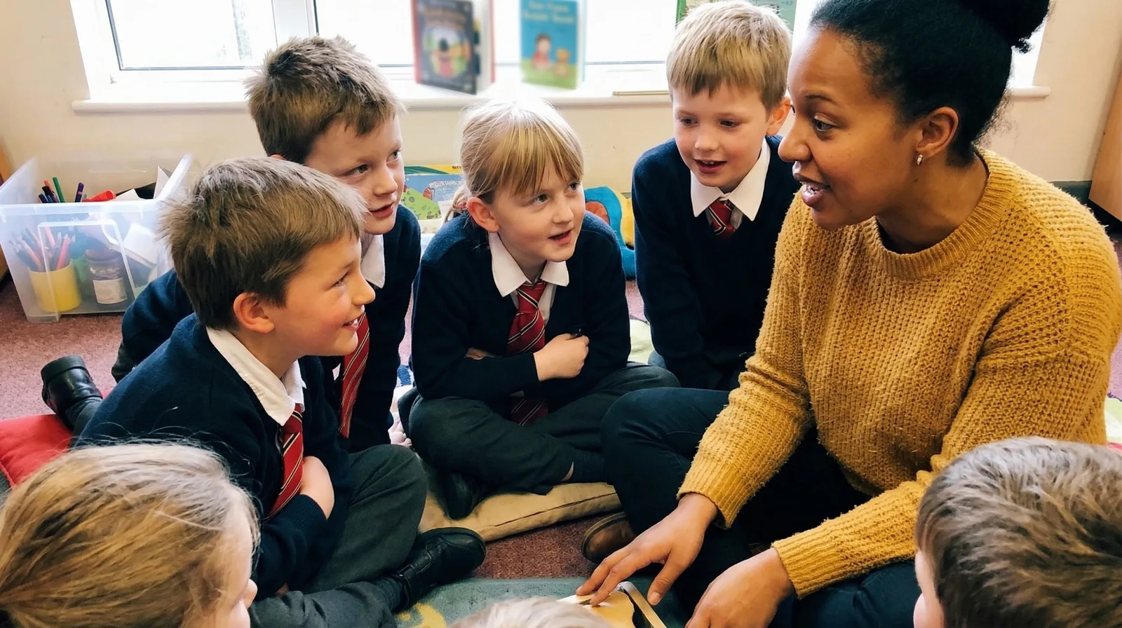 Primary school pupils gathered for a circle-time RSE session led by a Tailor educator